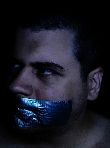 Duct tape gagged