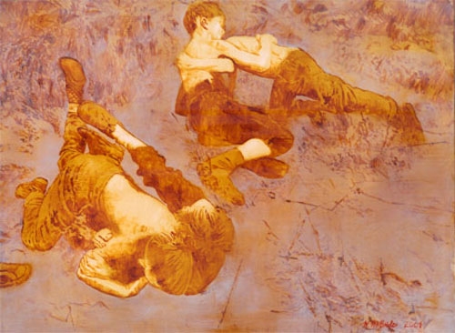 Boys fighting on the sand