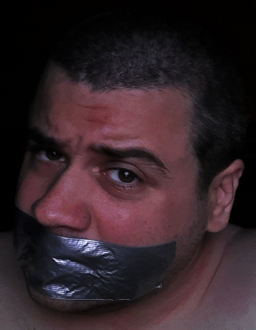 Duct tape gagged