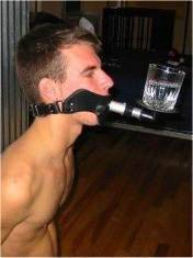 SLAVE SERVES A DRINK AT MAS*TER'S PARTY