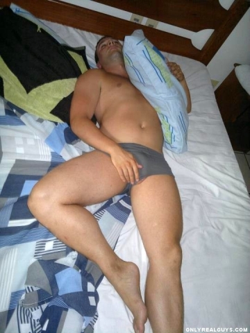 College guy passed out in tiny, bulging briefs...balls almost out!