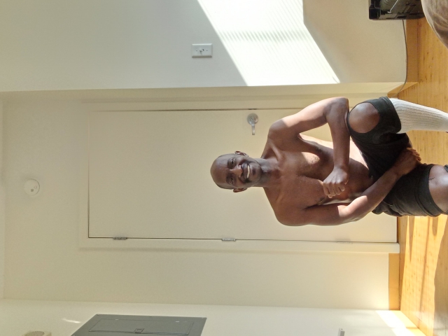 Dan M Nude Kneeling In His Bedroom 1