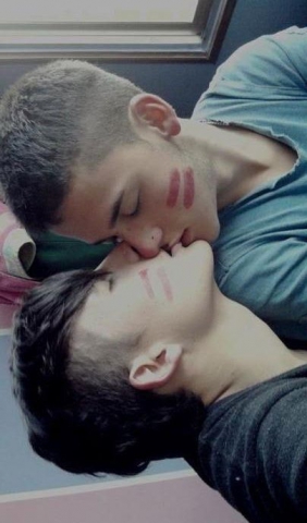 Gay young boys kisses in lthe heat of ove 