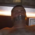 Tape gagged in Magnum Sauna