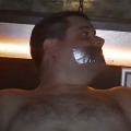 Tape gagged in Magnum Sauna